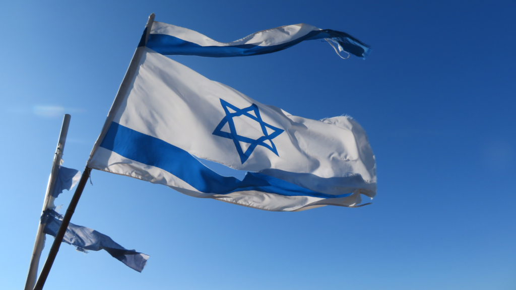 Zerstörte israelische Flagge (über cozmo news)